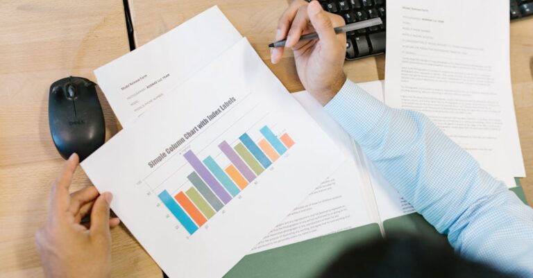 Analista de dados examinando gráficos estatísticos em computador com expressão concentrada